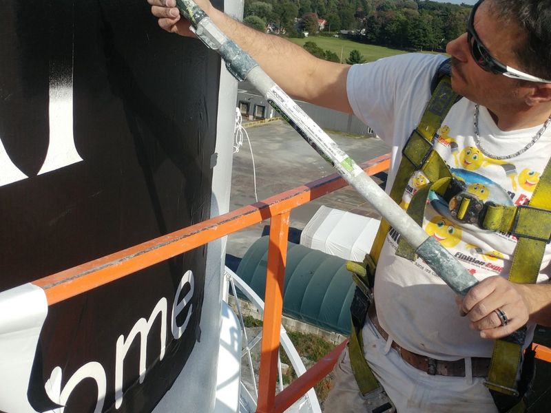 Peinture commerciale — Peinture enseigne sur elevateur à Sorel‑Tracy