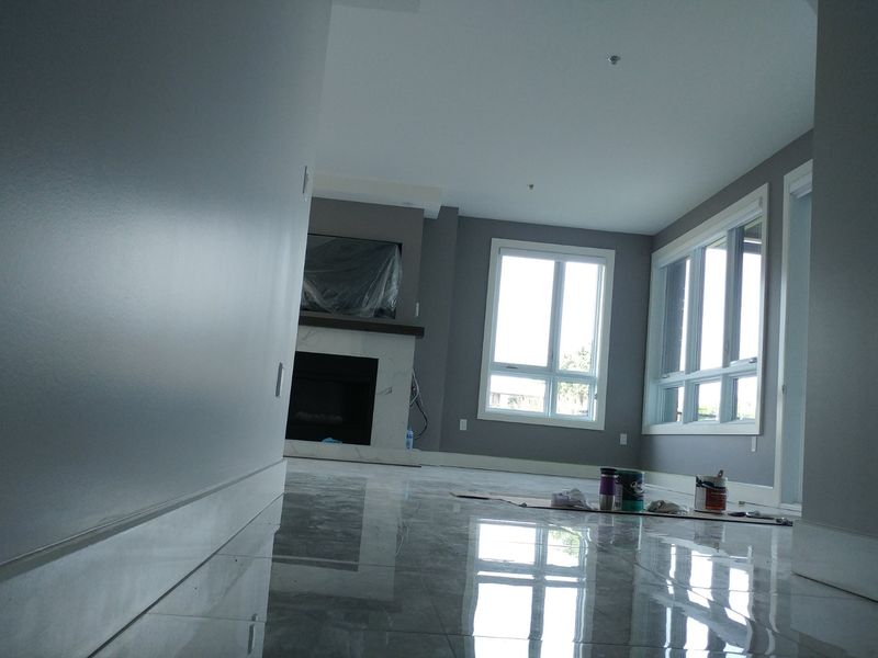 Peinture intérieure — Chambre salon murs gris 01 à Sorel‑Tracy